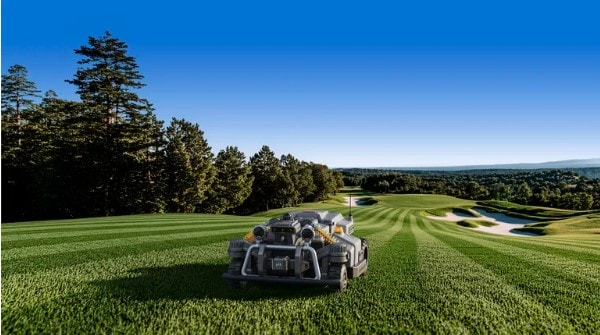 Commercial robotic mower working on a golf course